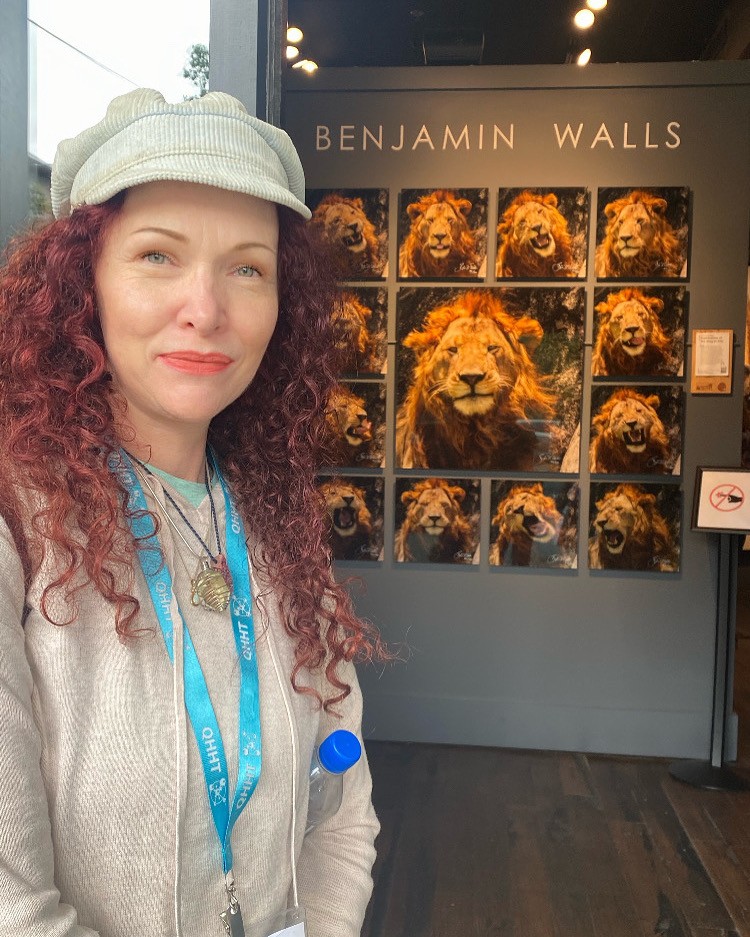 Standing in front of the lion in downtown Asheville-Benjamin Walls